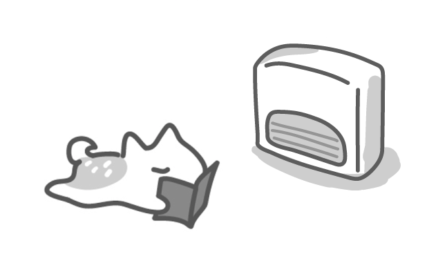 ストーブの前でうつ伏せで本を読む鹿さんのイラスト